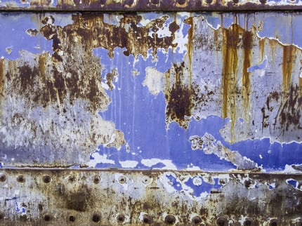 Nautical grunge Hull of fishing boat badly in need of restoration